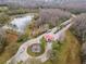 A gated community entrance with a decorative fountain and beautifully landscaped grounds, creating an inviting arrival at 8219 Summer Brook Ct, Land O Lakes, FL 34638