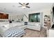 Cozy living room featuring a large sectional sofa and wood-look tile flooring at 8219 Summer Brook Ct, Land O Lakes, FL 34638