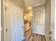 Welcoming entryway featuring hardwood floors, neutral paint, and a decorative niche at 11246 Kapok Grand Cir, Madeira Beach, FL 33708