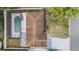Aerial view of a home with a screened pool and a well-maintained brown shingle roof at 11350 112Th Ave, Largo, FL 33778
