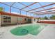 Inviting screened pool area perfect for outdoor relaxation and entertainment with ample deck space at 11350 112Th Ave, Largo, FL 33778