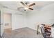 The bedroom features a ceiling fan, carpeted flooring, and a closet at 11476 Sage Canyon Dr, Riverview, FL 33578