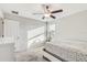 Comfortable bedroom featuring a window for natural light and neutral wall paint at 11476 Sage Canyon Dr, Riverview, FL 33578