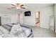 Comfortable main bedroom featuring a ceiling fan, carpet flooring, and serene ambiance at 11476 Sage Canyon Dr, Riverview, FL 33578