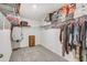 Spacious walk-in closet with shelving, hanging rods, and storage for clothes and shoes at 11476 Sage Canyon Dr, Riverview, FL 33578