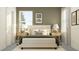 Inviting bedroom featuring coordinated decor, bedside tables, and a tranquil setting at 11543 71St E Ave, Palmetto, FL 34221