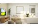 Relaxing living room area with a sectional couch, TV and decorative accents at 11543 71St E Ave, Palmetto, FL 34221