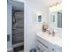 Bathroom featuring a vanity with a mirror and a walk-in shower at 11720 Park Blvd # 301, Seminole, FL 33772