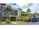 Well maintained multi-story building with mature tropical landscaping and convenient parking at 11720 Park Blvd # 301, Seminole, FL 33772