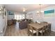 Inviting living area with dining space, seamlessly blending comfort and style with a relaxing living space at 11720 Park Blvd # 301, Seminole, FL 33772