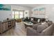 Cozy living room with plush seating, stylish decor, and a relaxing atmosphere at 11720 Park Blvd # 301, Seminole, FL 33772