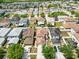 This aerial view shows the home and neighborhood, mature landscaping and green spaces at 12107 Fox Bloom Ave, Gibsonton, FL 33534