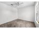 Comfortable bedroom with carpet floors and ample natural light at 12107 Fox Bloom Ave, Gibsonton, FL 33534