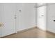Mud room features neutral color scheme, access door and tile flooring at 12107 Fox Bloom Ave, Gibsonton, FL 33534