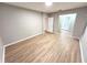 Spacious bedroom with wood flooring at 12499 Longstone Ct, New Port Richey, FL 34655