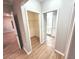 Hallway to walk-in closet and bathroom at 12499 Longstone Ct, New Port Richey, FL 34655