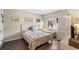 Bright bedroom featuring coastal themed decor at 14130 Rosemary Ln # 1202, Largo, FL 33774