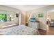 Bright bedroom with outside view and coastal themed decor at 14130 Rosemary Ln # 1202, Largo, FL 33774