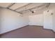 Clean and organized garage with new door and equipment, ready for parking or storage at 1717 Thames St, Clearwater, FL 33755