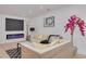 Cozy living room with a modern electric fireplace, sofa, and contemporary decor at 1717 Thames St, Clearwater, FL 33755