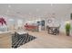 Open-concept living space with a modern kitchen, dining area, and comfortable living room at 1717 Thames St, Clearwater, FL 33755
