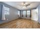 Bedroom with hardwood floors and three windows providing lots of natural light at 1760 Sharondale Dr, Clearwater, FL 33755