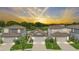 Aerial view of a neighborhood showcasing well-maintained homes with green spaces in the background at 20659 Drake Elm Dr, Land O Lakes, FL 34638