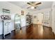 Walk in closet features hard wood floors, built-in organizers, and opens to the main bedroom at 213 Sheffield E Cir, Palm Harbor, FL 34683