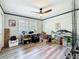 Bright hobby room with a ceiling fan, a window for natural light, and ample storage space at 213 Sheffield E Cir, Palm Harbor, FL 34683