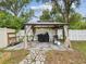 Backyard featuring a gazebo, grill, and stone path at 232 Emerald Ln, Largo, FL 33771