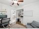 Comfortable room offers a ceiling fan, built-in shelves, and great natural light at 232 Emerald Ln, Largo, FL 33771