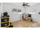This bedroom has ceiling fan, and natural lighting at 232 Emerald Ln, Largo, FL 33771