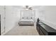This well lit bedroom has neutral colors, a ceiling fan, and carpeted floors at 232 Emerald Ln, Largo, FL 33771