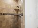 Modern tiled shower with a shower head at 232 Emerald Ln, Largo, FL 33771