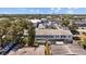 Overhead angle shows property with trees, building, and a parking lot at 2366 Shelley St # 7, Clearwater, FL 33765