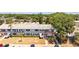 Aerial view of apartment building with lush trees and landscaping at 2366 Shelley St # 7, Clearwater, FL 33765