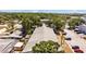 Birds-eye view of property with surrounding homes, trees, and nearby businesses at 2366 Shelley St # 7, Clearwater, FL 33765