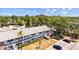 Overhead angle shows apartment building, trees, and a parking lot at 2366 Shelley St # 7, Clearwater, FL 33765