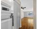 Interior laundry room with sliding door, washer, and dryer in unit at 2366 Shelley St # 7, Clearwater, FL 33765