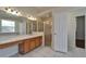 Bright bathroom with a vanity, shower, and tile floors at 2515 Centennial Falcon Dr, Valrico, FL 33596