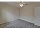 Bedroom with neutral walls, gray carpet, and a ceiling fan at 2515 Centennial Falcon Dr, Valrico, FL 33596