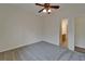Bedroom featuring neutral carpet and an ensuite bathroom at 2515 Centennial Falcon Dr, Valrico, FL 33596