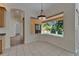 Breakfast nook with tiled floors, large windows, and decorative light fixture at 2515 Centennial Falcon Dr, Valrico, FL 33596