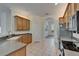 Spacious kitchen featuring stainless steel appliances, tile flooring, and plenty of counter space at 2515 Centennial Falcon Dr, Valrico, FL 33596