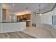 Bright kitchen featuring stainless steel appliances, wood cabinetry and an adjacent breakfast nook at 2515 Centennial Falcon Dr, Valrico, FL 33596