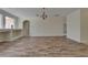 Large living room displays beautiful flooring and an open layout for a comfortable and inviting atmosphere at 2515 Centennial Falcon Dr, Valrico, FL 33596