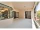 Spacious enclosed lanai with floor to ceiling windows and multiple access points to the home at 2515 Centennial Falcon Dr, Valrico, FL 33596
