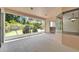 Enclosed outdoor patio featuring views of the backyard at 2515 Centennial Falcon Dr, Valrico, FL 33596