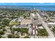 Aerial view of condo community near retail with close proximity to the water at 2525 W Bay Dr # A20, Belleair Bluffs, FL 33770
