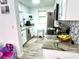 Updated kitchen features granite counters, stainless steel appliances, and modern cabinetry at 2525 W Bay Dr # A20, Belleair Bluffs, FL 33770
